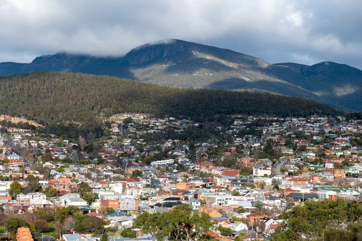 Hobart's hillside suburbs with kunanyi/Mount Wellington behind them, Tasmania
