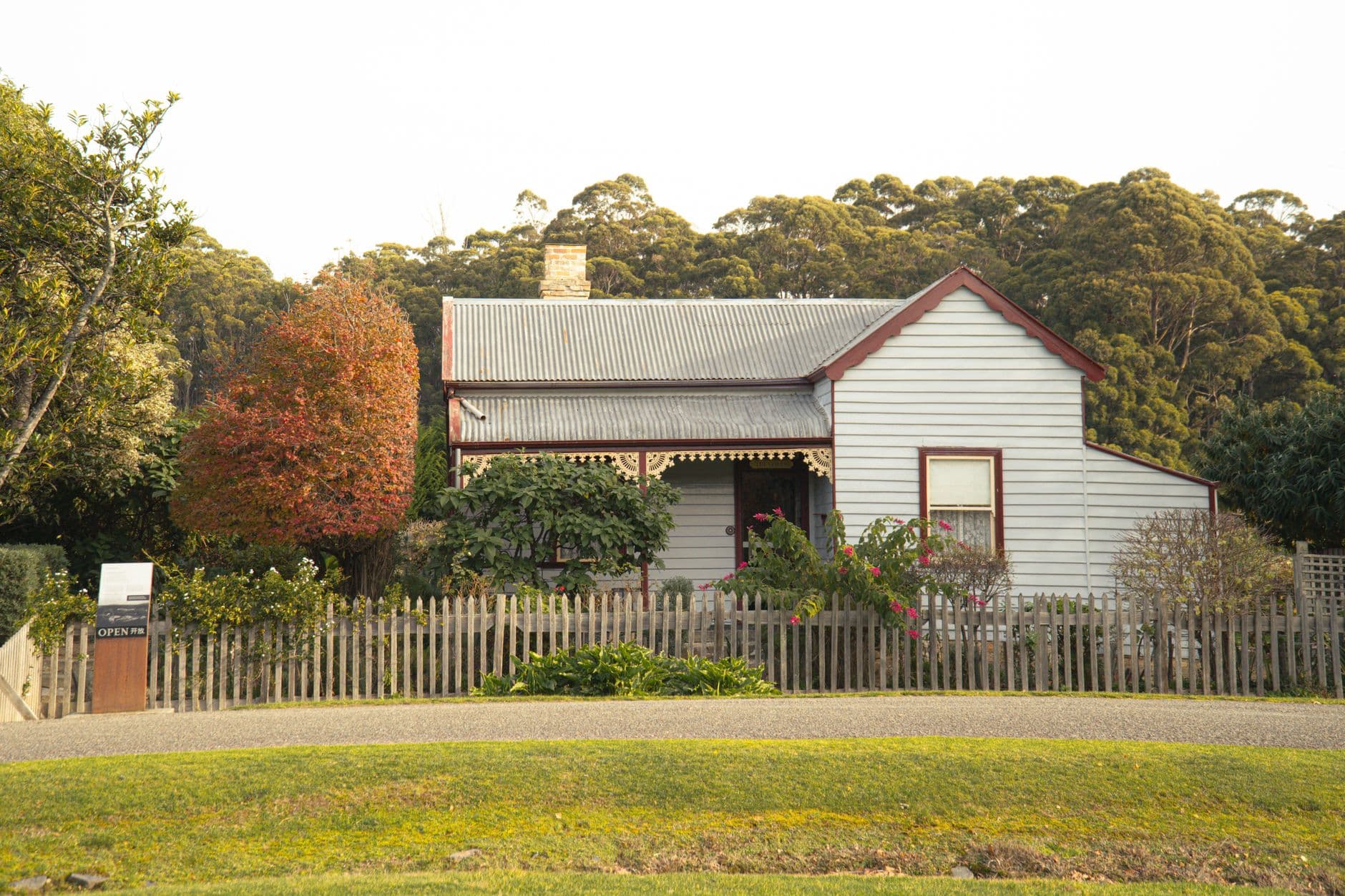 A historic house surrounded by garden greenery in Tasmania